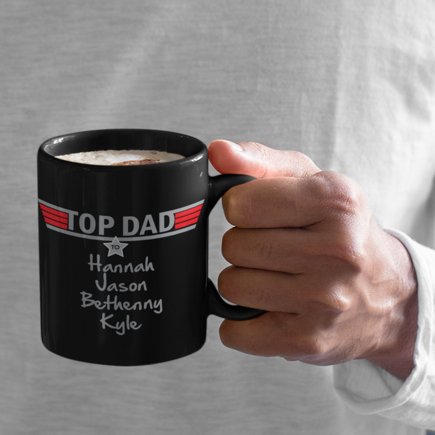 man holding a top dad personalized black mug add names