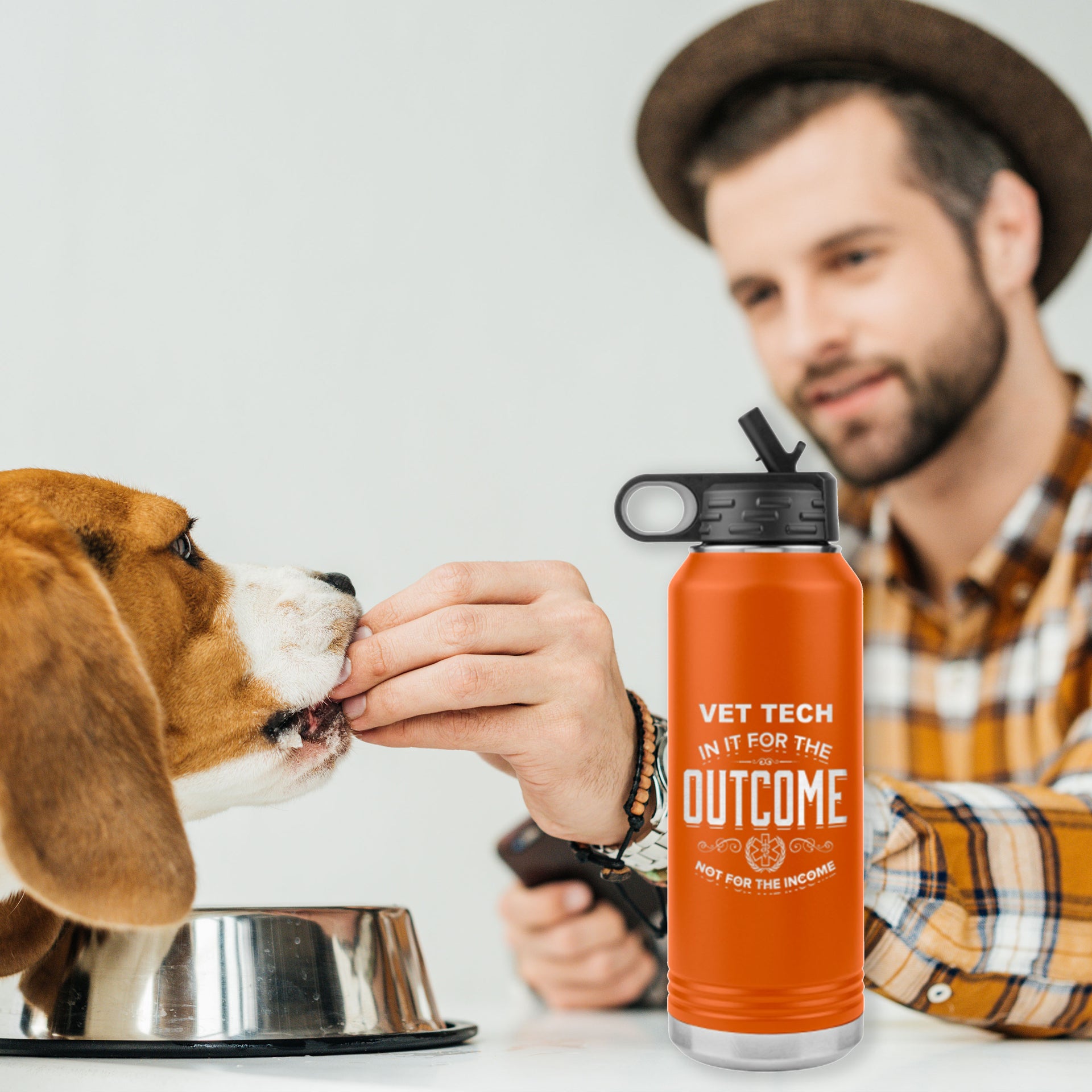 mand and dog with a vet tech appreciation etched stainless steel orange water bottle